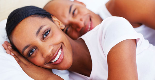 image of couple sleeping