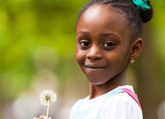Image of happy girl with asthma