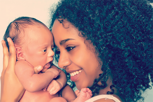 image of woman with newborn