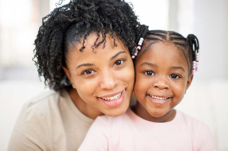 Image of teen mom and her cute baby