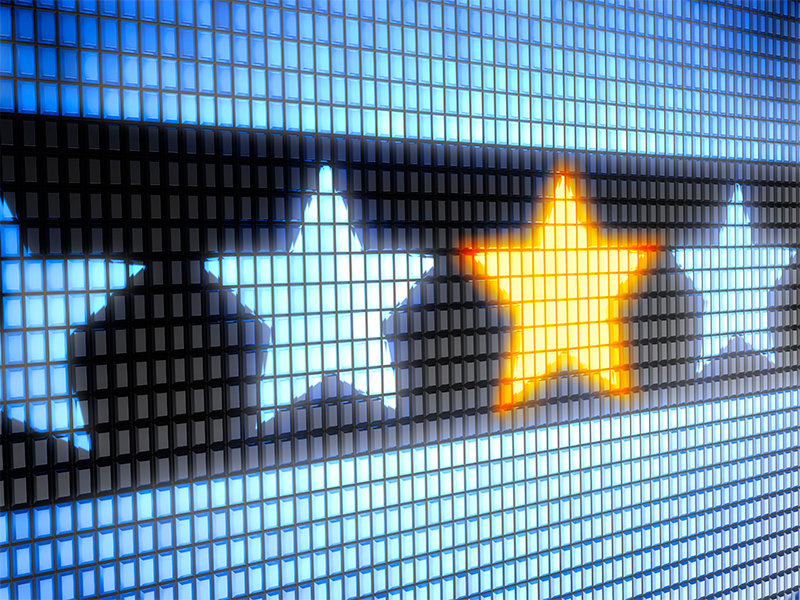 Image of stars on a led screen representing those who have thrived