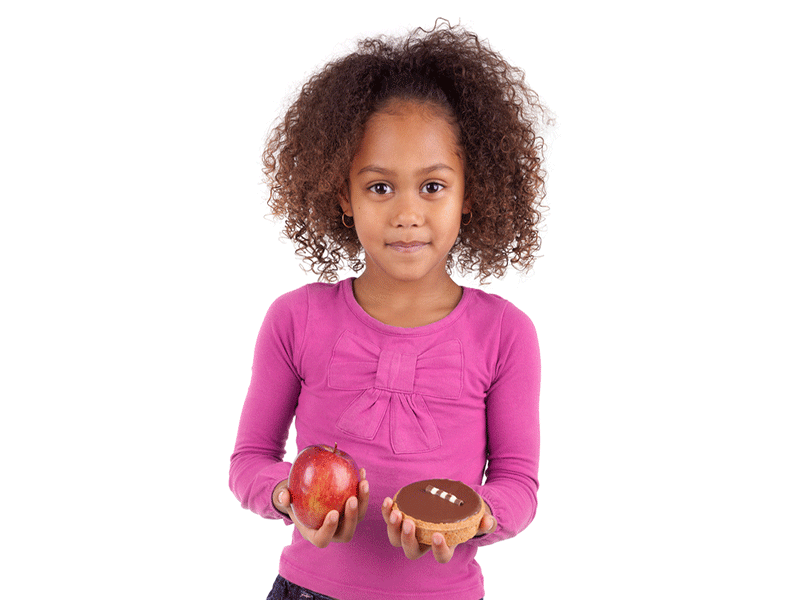 Image of little girl with sugar donut and apple