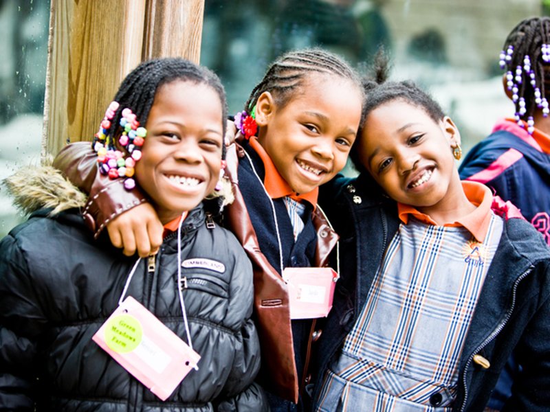 Image of three girls in the community