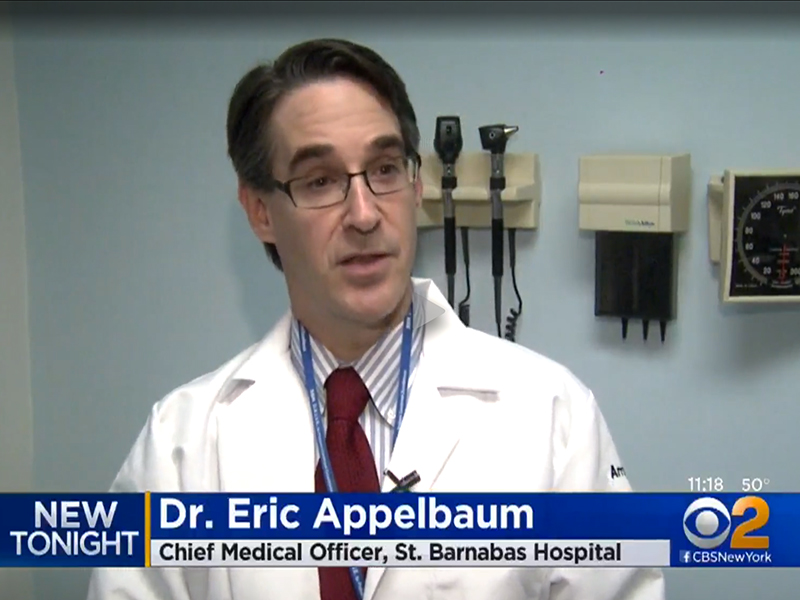 Image of Dr. Eric Appelbaum discussing holistic treatments