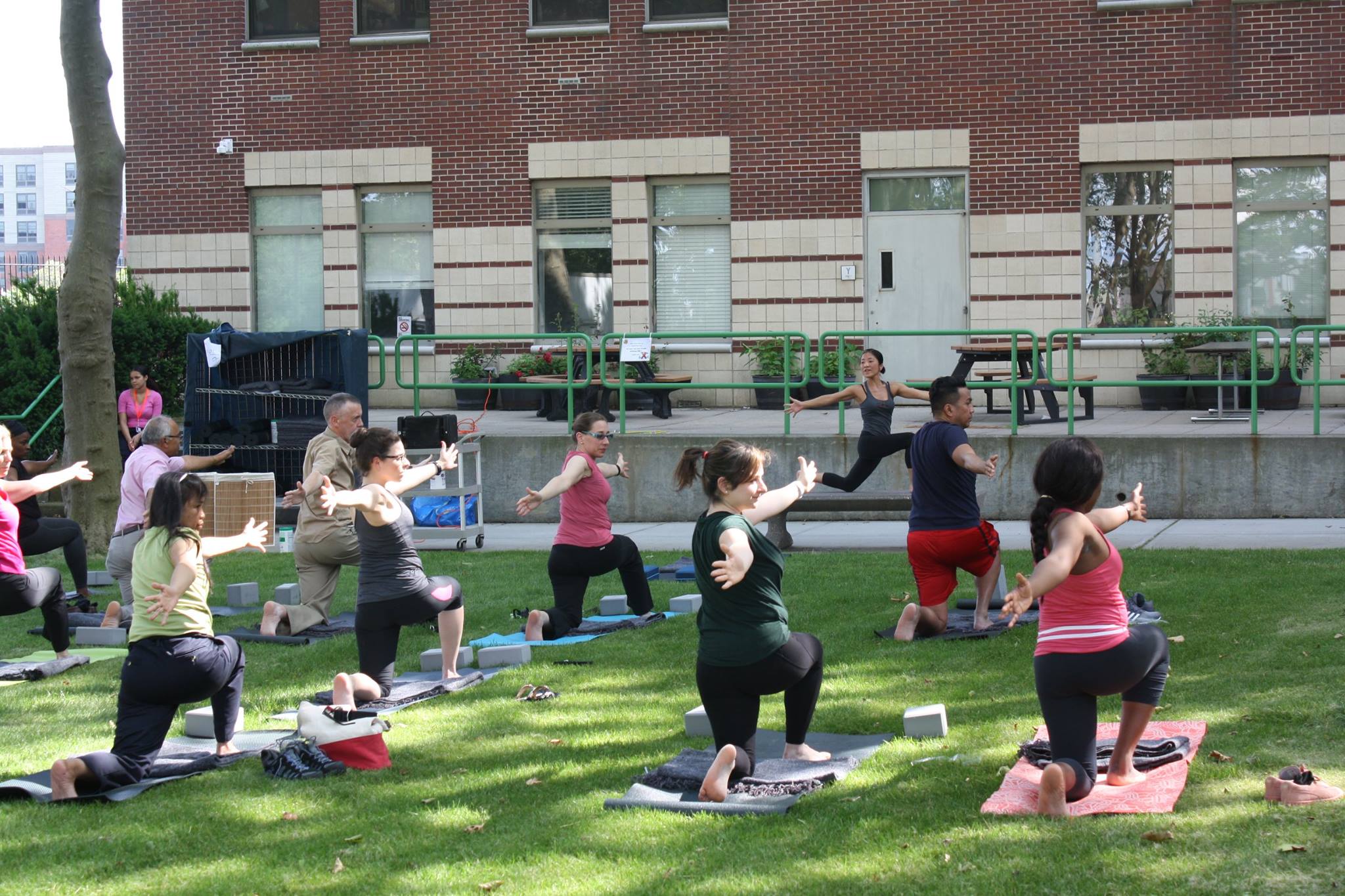 Image of Dr. J. Robin Moon Leading a Yoga Class for Employees at Queens Park Hospital